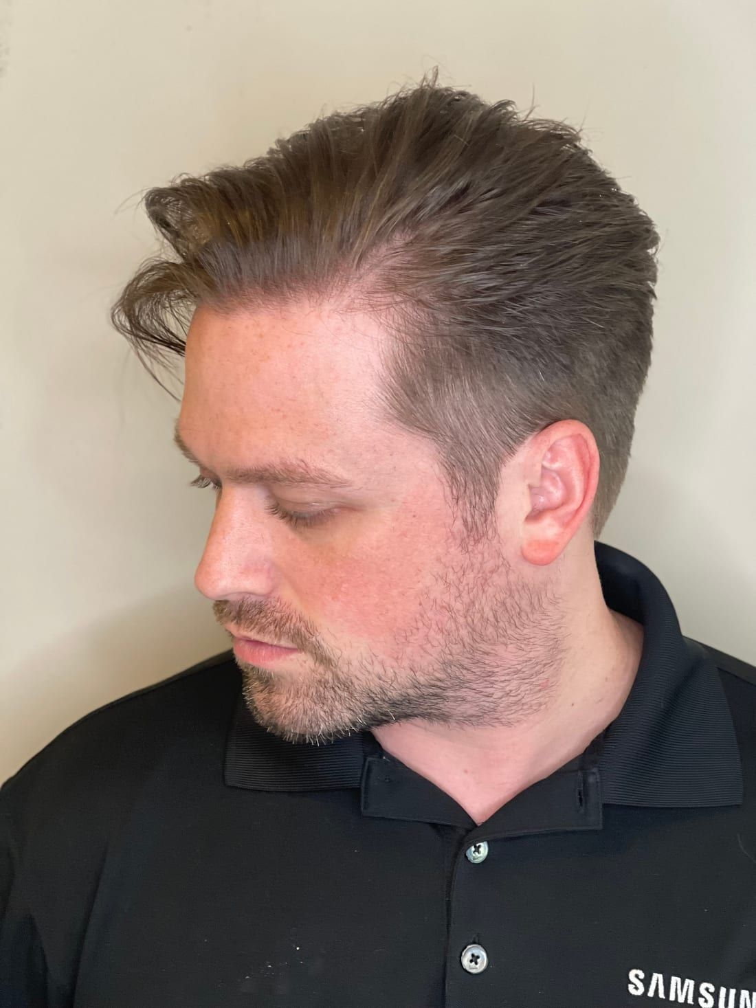 A men's textured cut with a tapered back and sides, cut at Alora Salon in Robinson Township